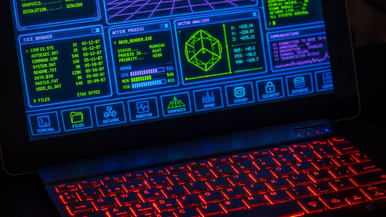 A laptop showing system, network and monitoring panels above a red-backlit keyboard